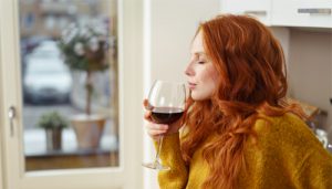 Woman drinking red wine