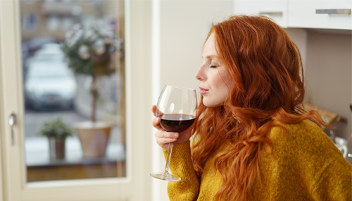 Woman drinking red wine