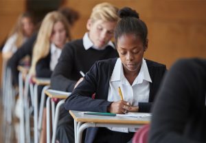 Teenage schoolgirl sits exam
