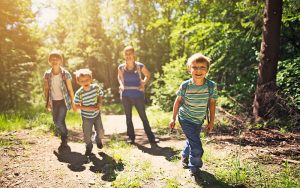 Young family hike in the woods