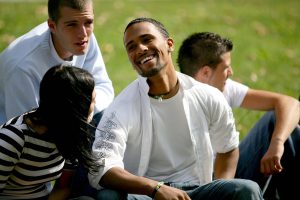 20 somethings sitting in the park