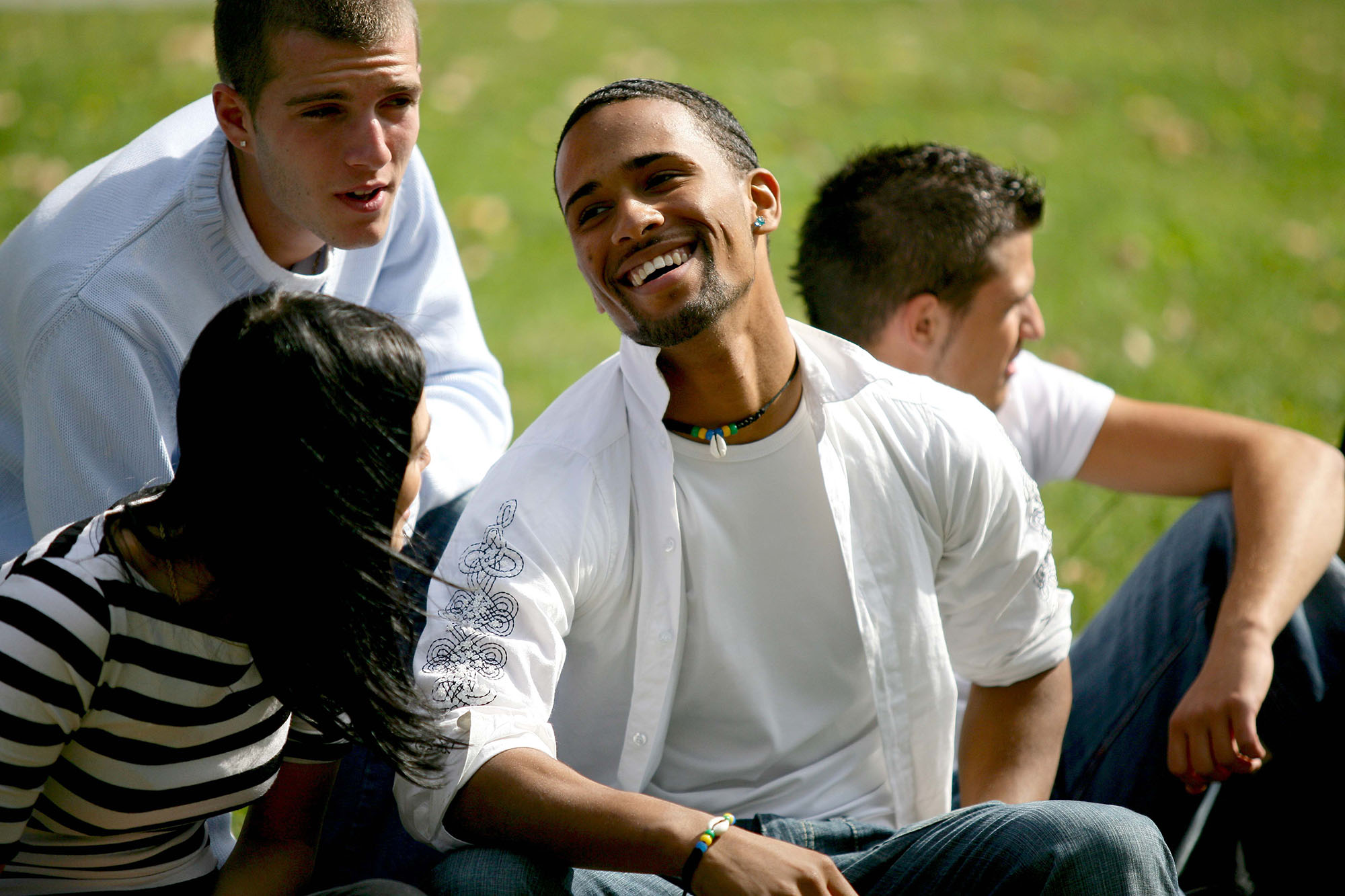 20 somethings sitting in the park