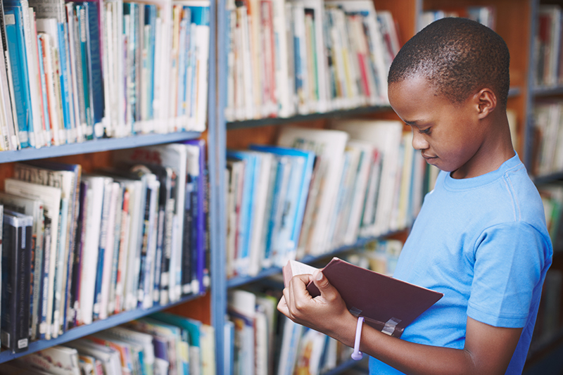 Boy in a library