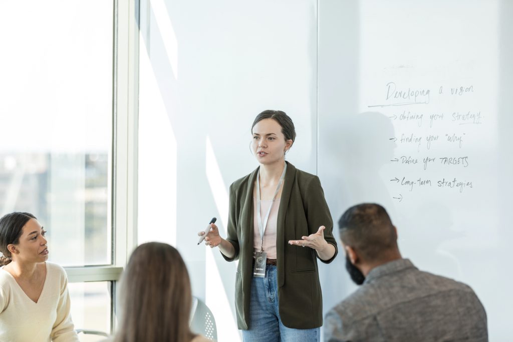 Woman at work giving a presentation